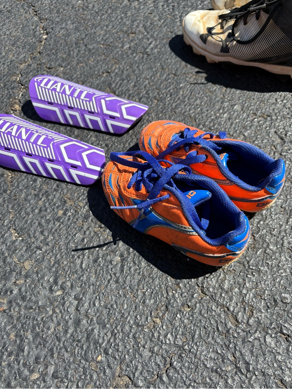 Kids Orange and Blue Soccer Cleats